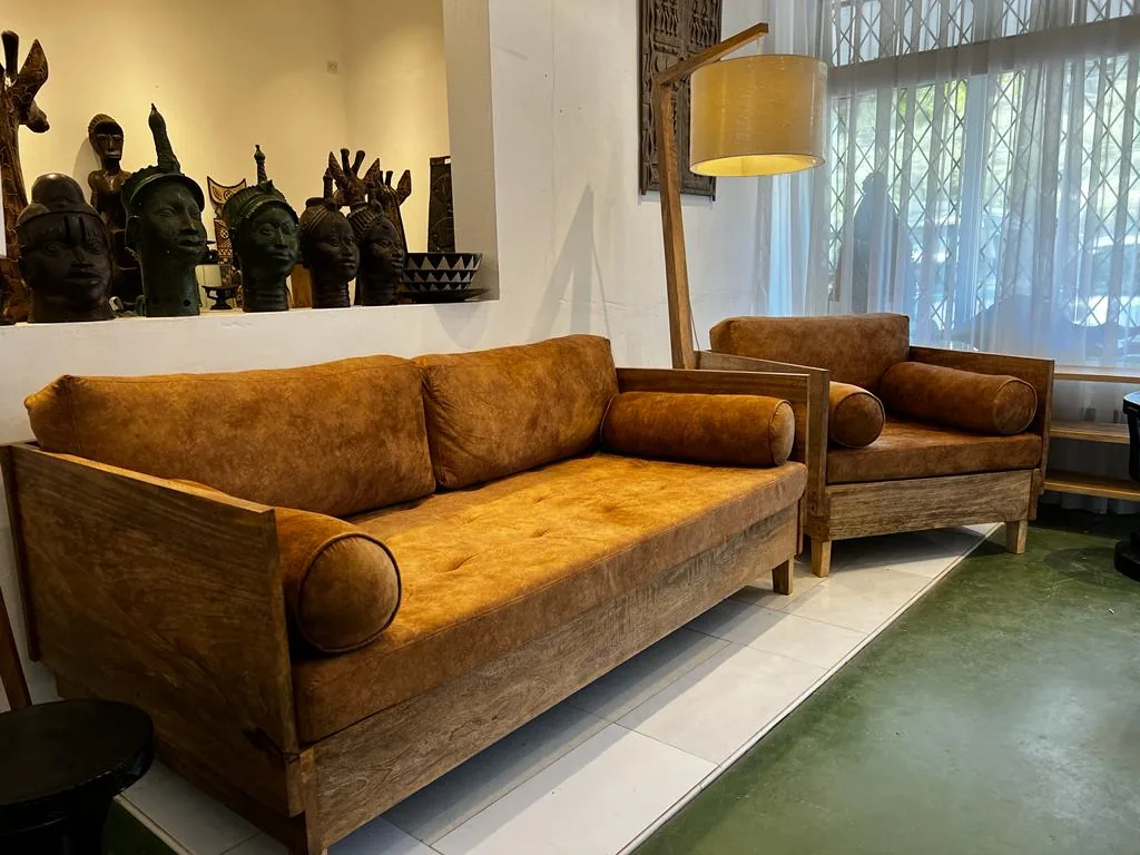 Bespoke timber sofa and armchair in the Jua Range showroom